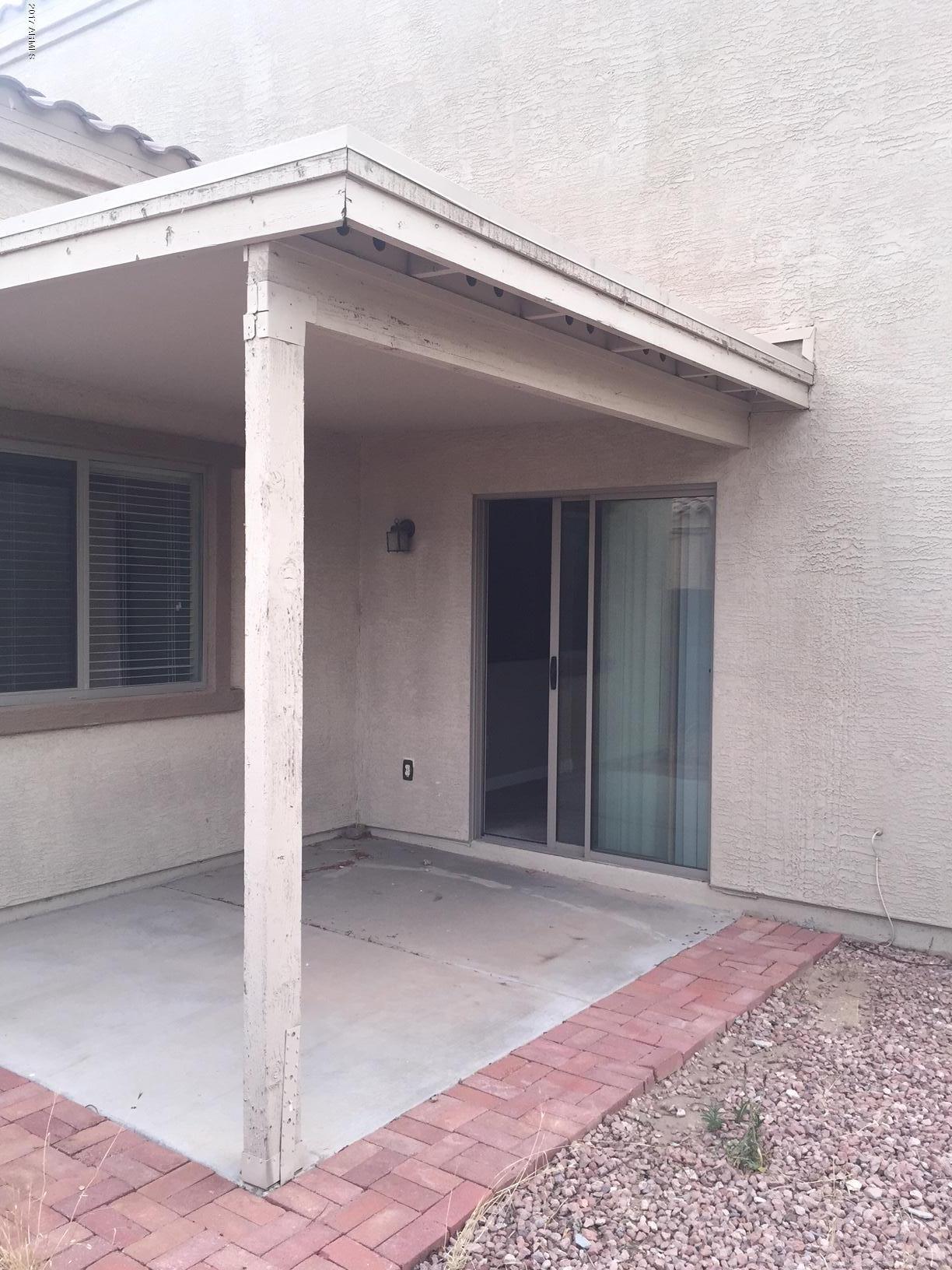 17544 West Hearn Road Surprise, AZ 85388 - Photo 16 of 17 a view of a house with a balcony