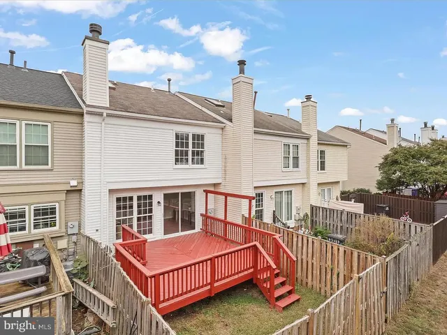 a view of a brick building with many windows