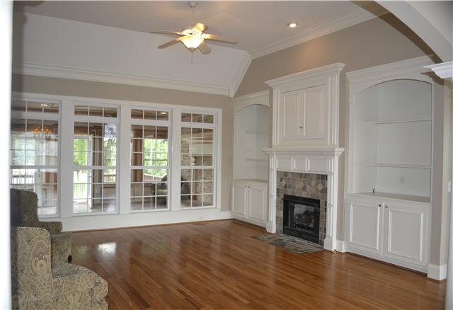 1606 Fair House Road Spring Hill, TN 37174 - Photo 3 of 20 Living Room - Built-ins w/ Fireplace and opens to the Sunroom!!