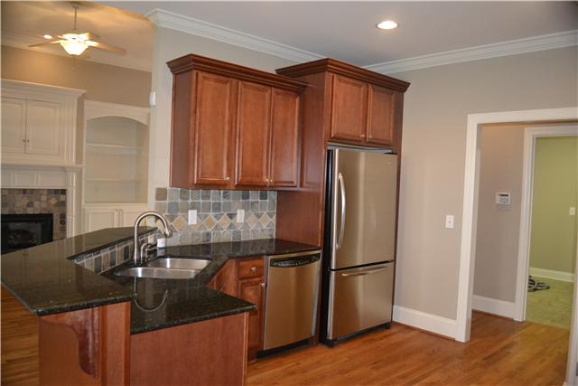 1606 Fair House Road Spring Hill, TN 37174 - Photo 6 of 20 Kitchen - Stainless Appliances, Opens to the Living Room