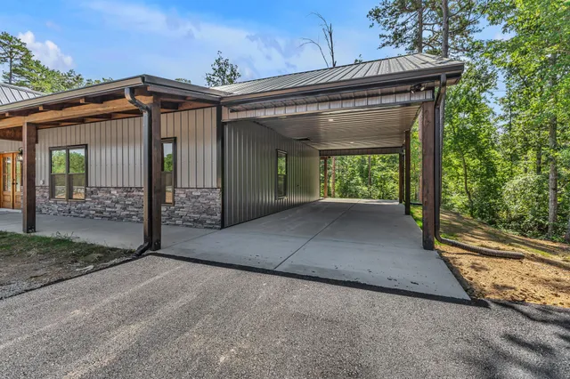 a view of a front door and wooden floor