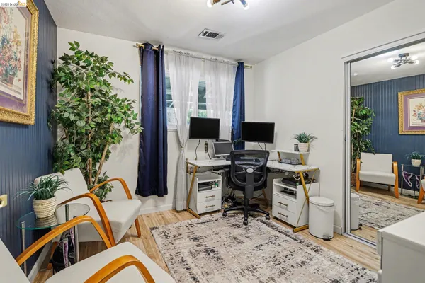 a view of a kitchen from the hallway