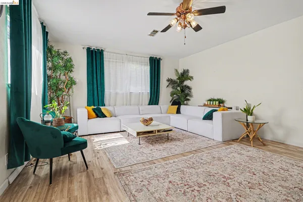 a view of a workspace with furniture