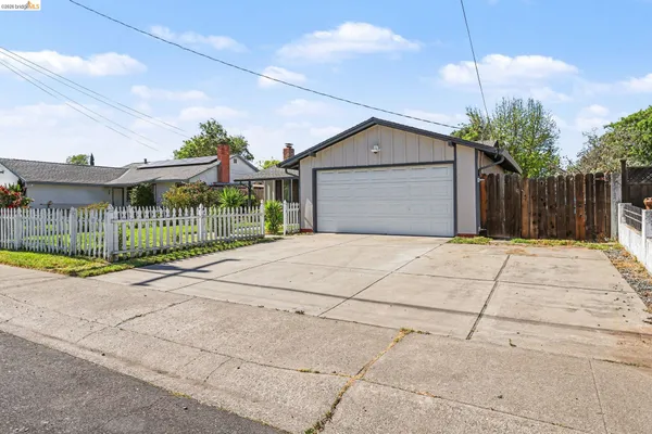 a front view of a house with a garage