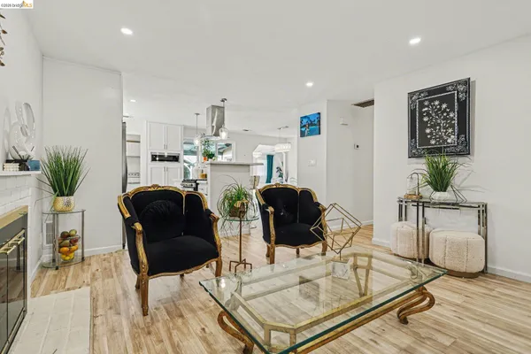 a living room with furniture and a table