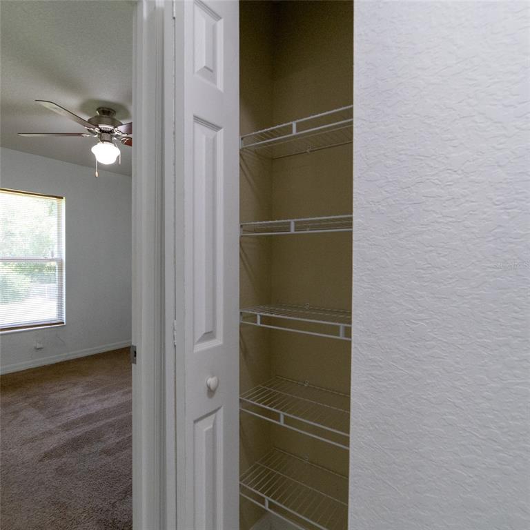 5107 Southwest 165th St Road Ocala, FL 34473 - Photo 28 of 34 a view of a room with a door