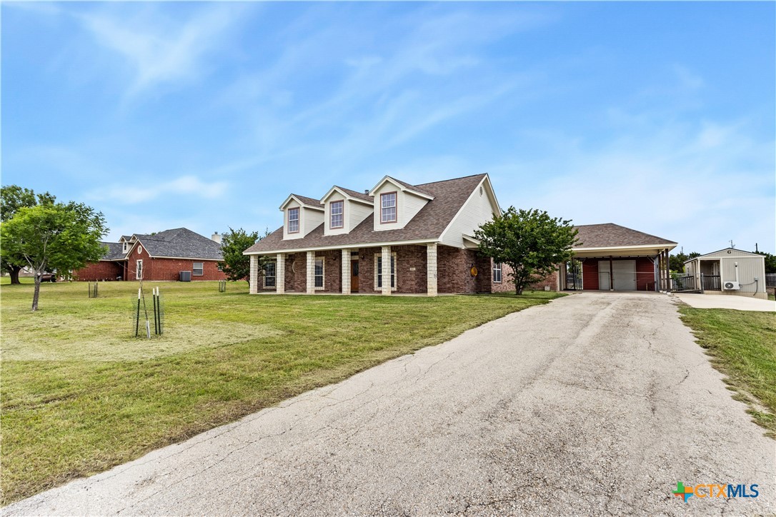 283 County Road 4710 Kempner, TX 76539 - Photo 3 of 47 a front view of a house with a yard