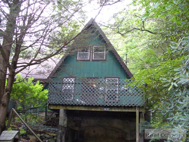 1637 Little Laurel Road Boone, NC 28607 - Photo 1 of 1 a front view of a house with a garden