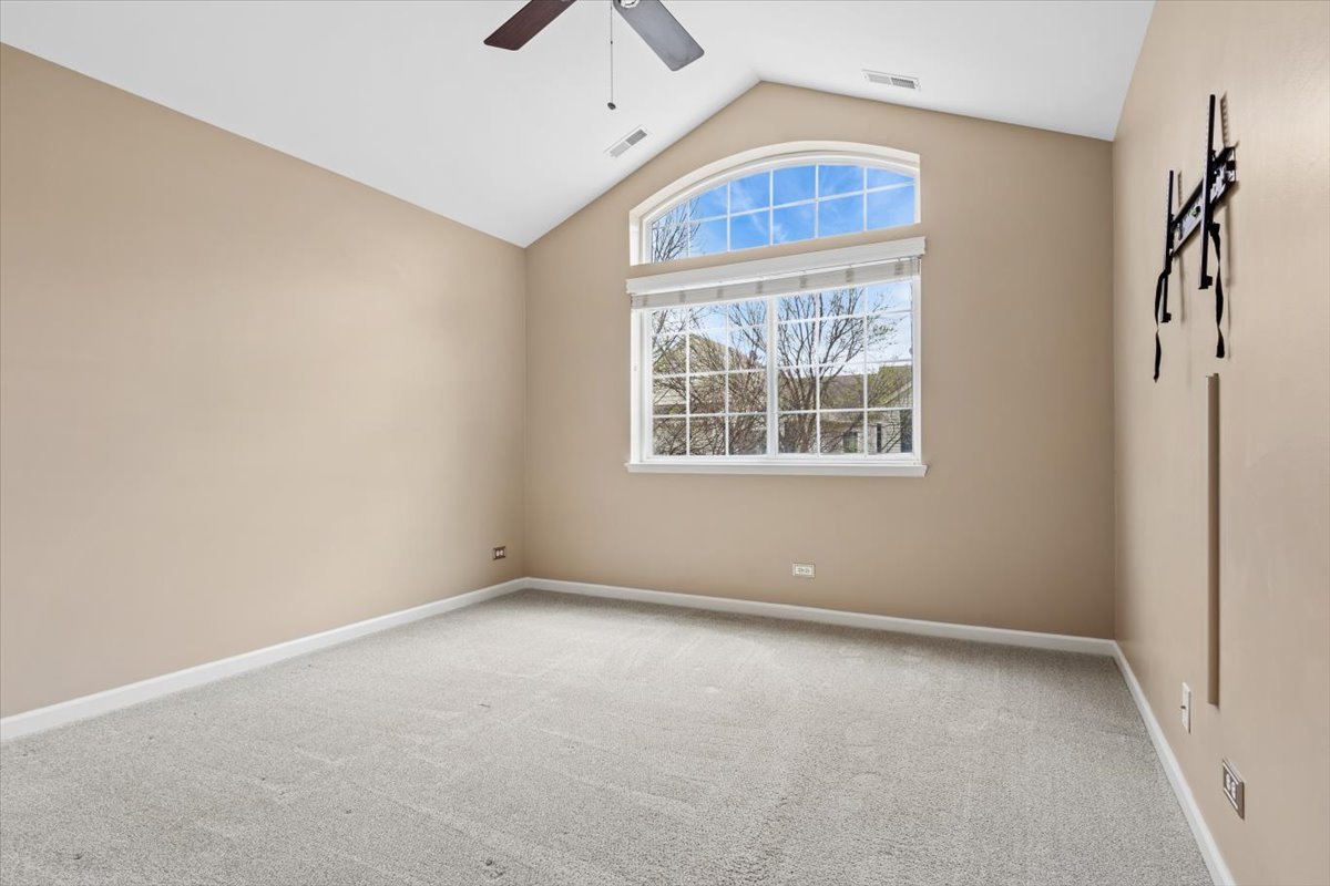 9965 Cummings Street Huntley, IL 60142 - Photo 16 of 23 an empty room with windows