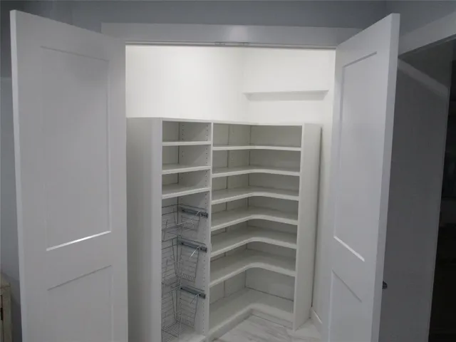 a backyard of a building with lots of green space