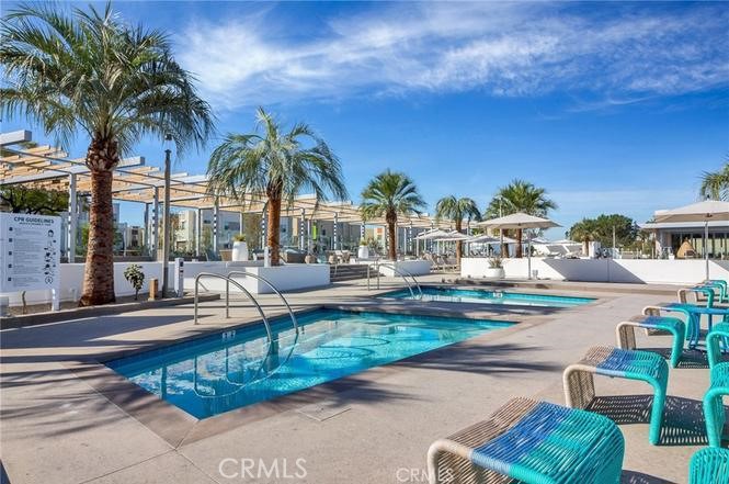 143 Frame Irvine, CA 92618 - Photo 32 of 41 a swimming pool with outdoor seating and yard