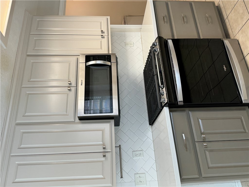 225 Karten Lane College Station, TX 77845 - Photo 19 of 45 recently remodeled kitchen with gas range; solid surface countertops, and all appliances included