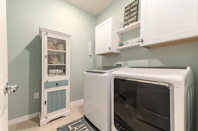 a living room with large windows