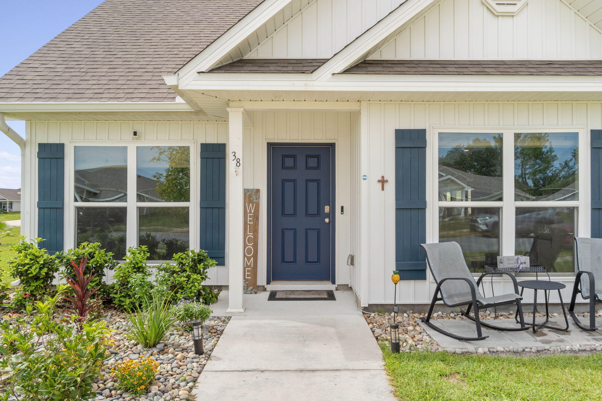38 Silverthorn Street Freeport, FL 32439 - Photo 7 of 42 a front view of a house with patio