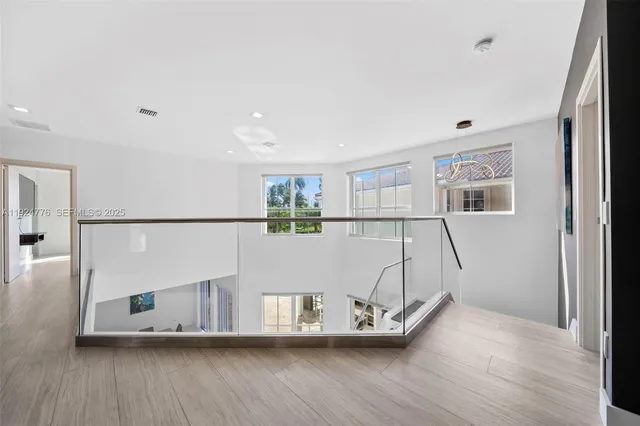 a view of livingroom and hardwood floor