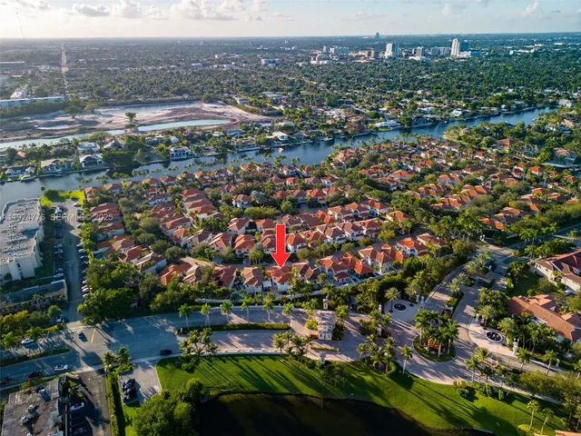 a backyard of a house with outdoor seating
