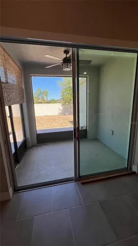 a living room with lots of furniture and a chandelier