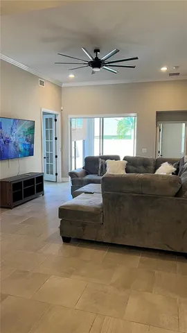 a kitchen with stainless steel appliances granite countertop a sink a stove and cabinets