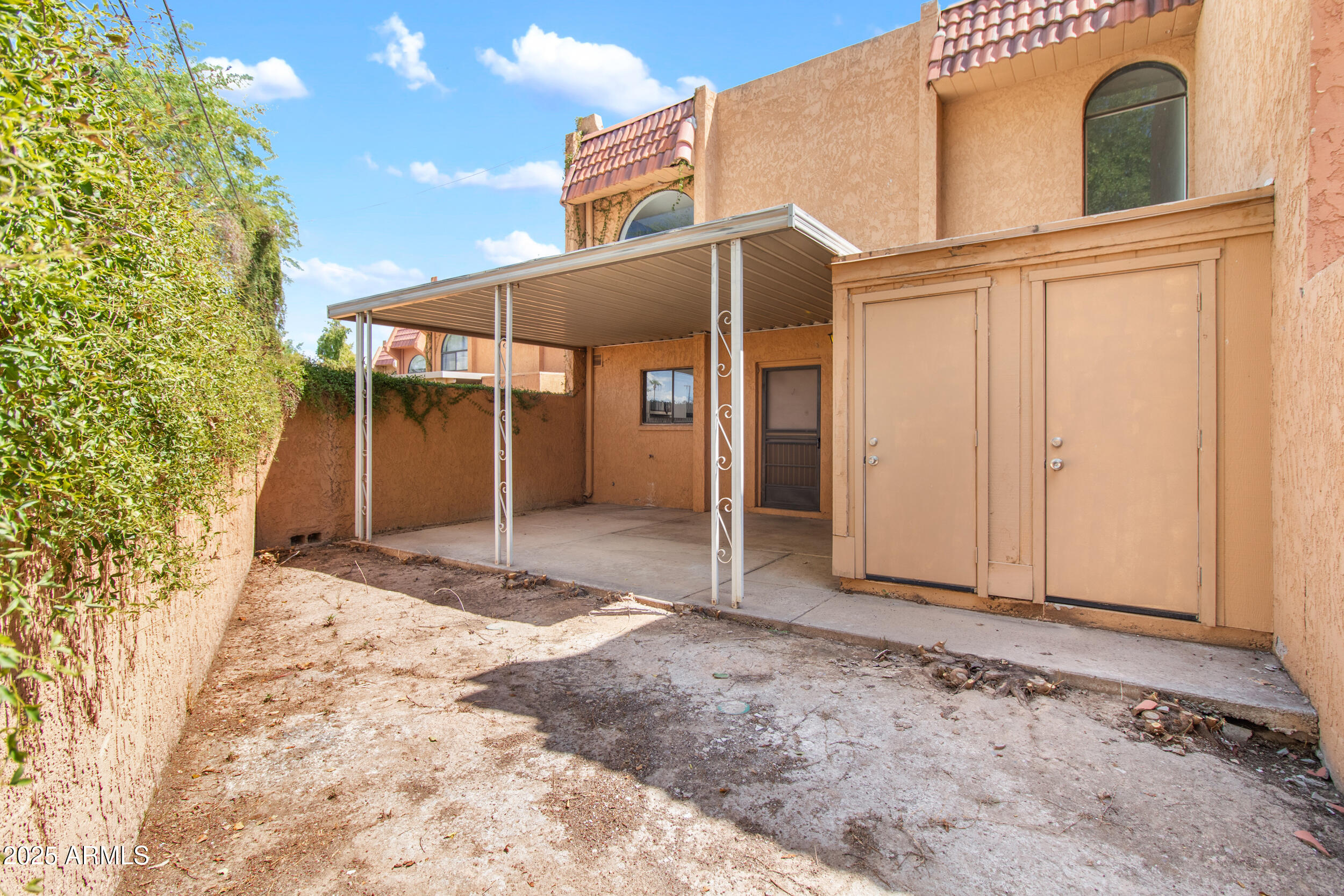 2500 North Hayden Road, Unit 15 Scottsdale, AZ 85257 - Photo 25 of 34 a view of a house with backyard