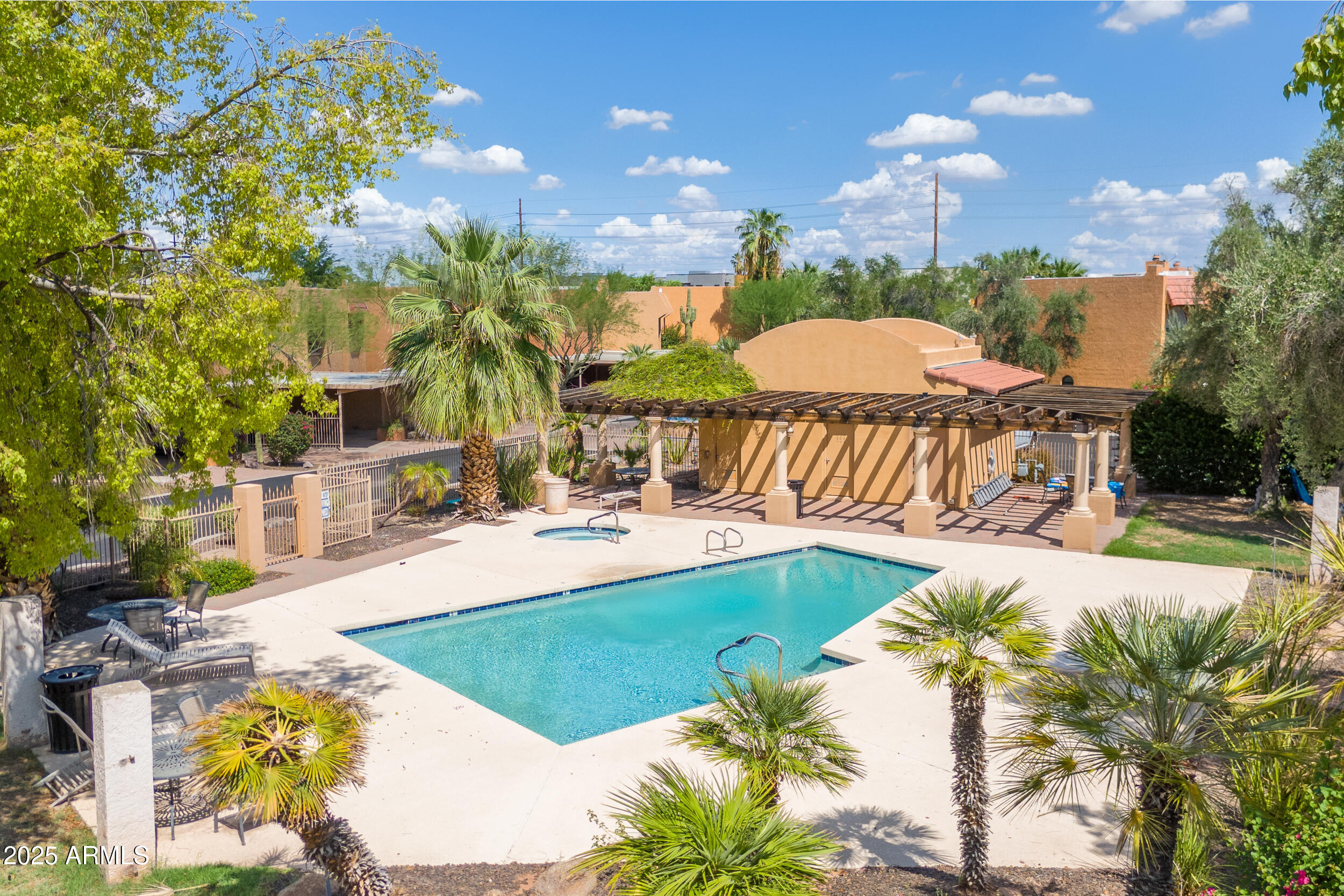2500 North Hayden Road, Unit 15 Scottsdale, AZ 85257 - Photo 26 of 34 a view of a swimming pool with a patio