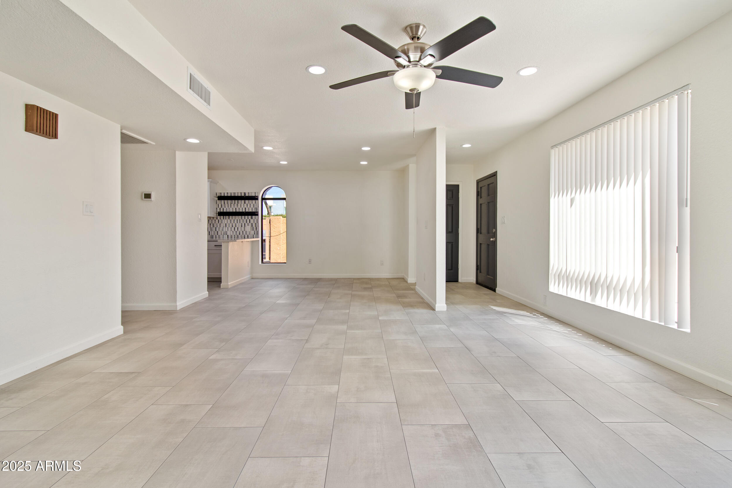 2500 North Hayden Road, Unit 15 Scottsdale, AZ 85257 - Photo 8 of 34 a view of an empty room with a window