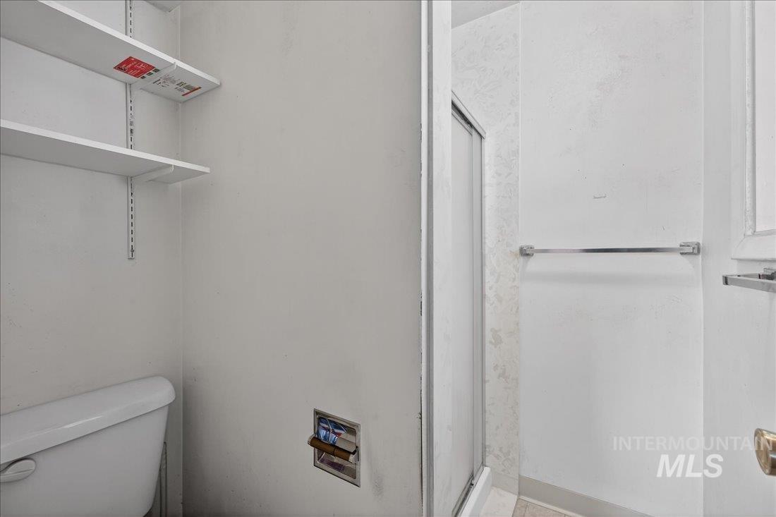 10035 W Lane Boise, ID 83709 - Photo 25 of 32 Full bath with a stall shower and toilet