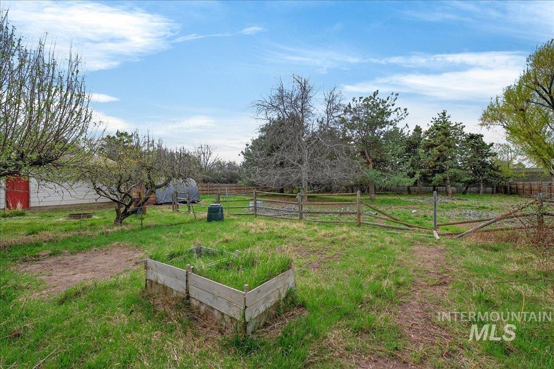 10035 W Lane Boise, ID 83709 - Photo 32 of 32 View of yard with a view of rural / pastoral area and a garden
