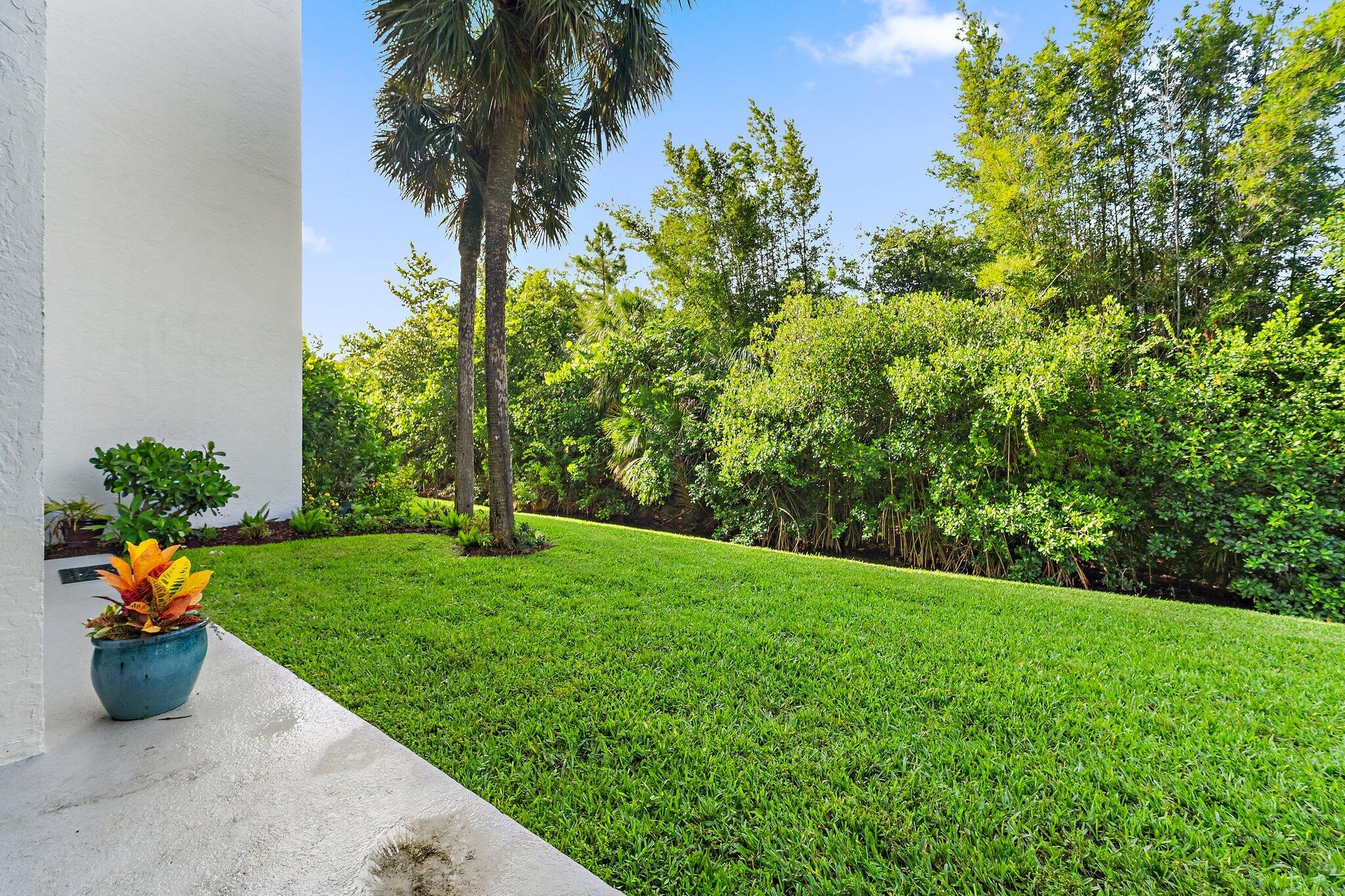 1605 South U Highway, Unit F 106 Jupiter, FL 33477 - Photo 23 of 43 a view of a garden with a flower garden
