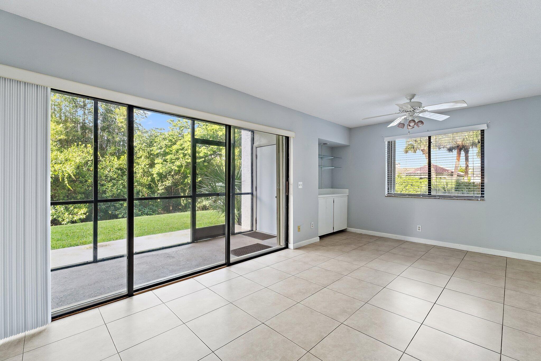1605 South U Highway, Unit F 106 Jupiter, FL 33477 - Photo 25 of 43 a view of an empty room and window