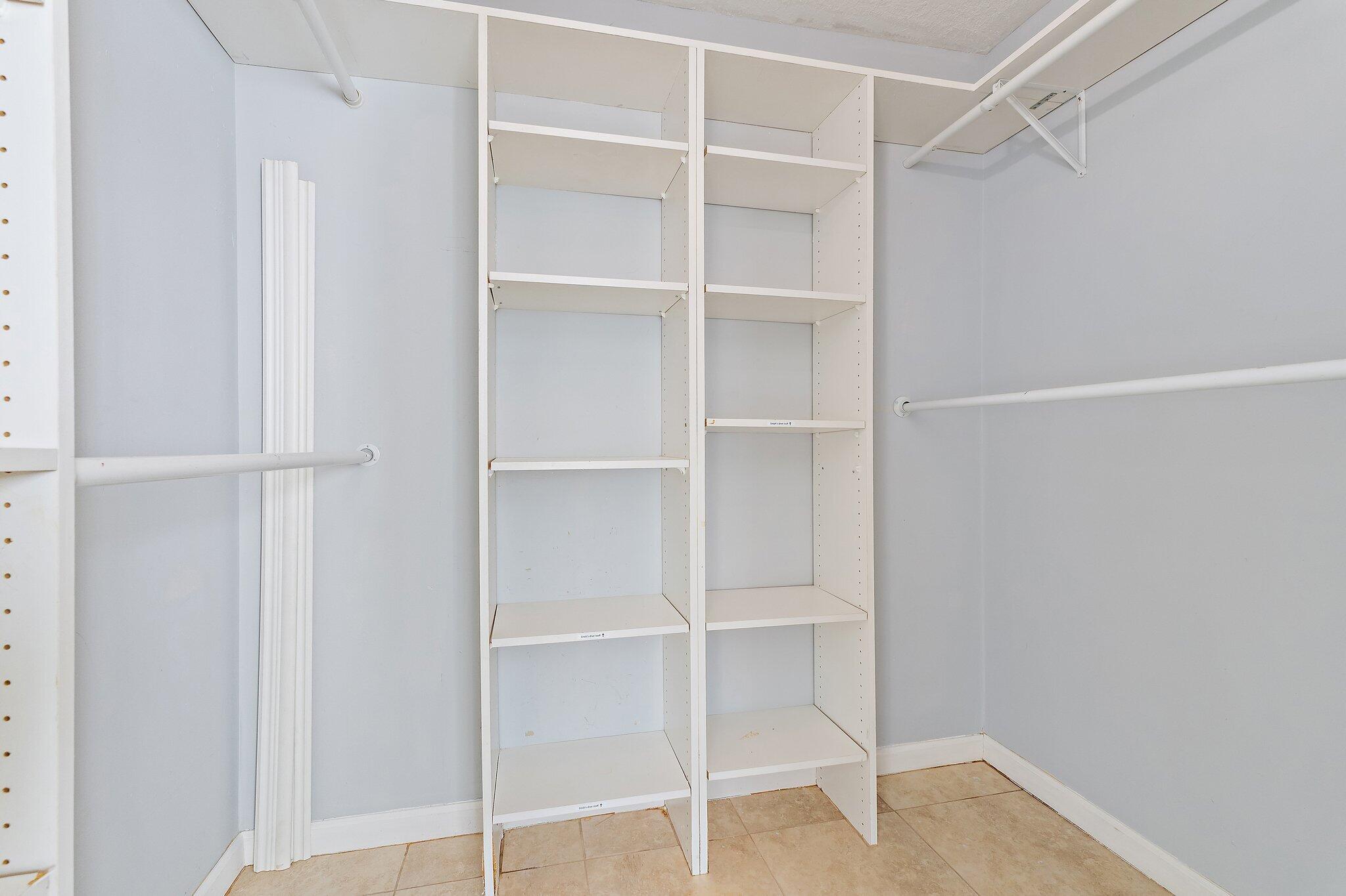 1605 South U Highway, Unit F 106 Jupiter, FL 33477 - Photo 42 of 43 a view of an empty walk in closet