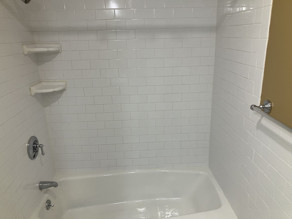 360 Neponset Street, Unit 605 Canton, MA 02021 - Photo 15 of 21 a close up of a bathtub