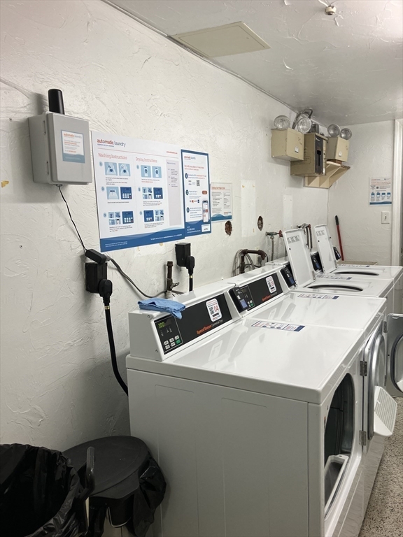 360 Neponset Street, Unit 605 Canton, MA 02021 - Photo 19 of 21 a utility room with dryer and washer