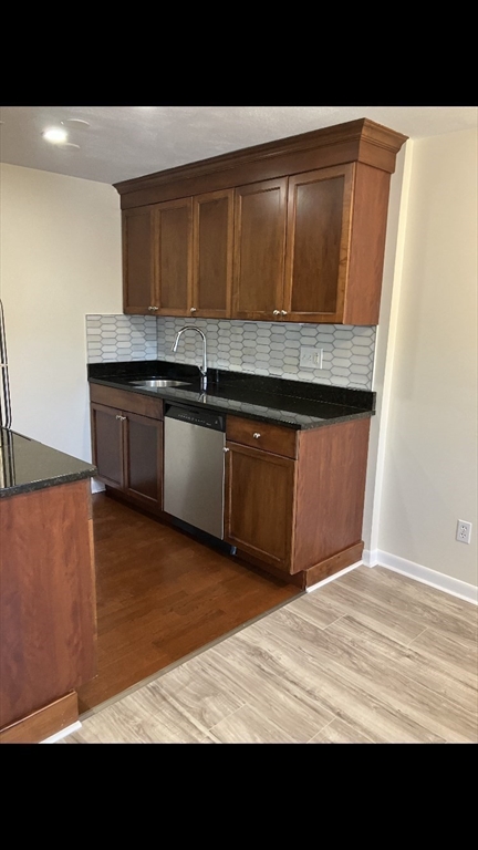 360 Neponset Street, Unit 605 Canton, MA 02021 - Photo 7 of 21 a view of kitchen cabinets