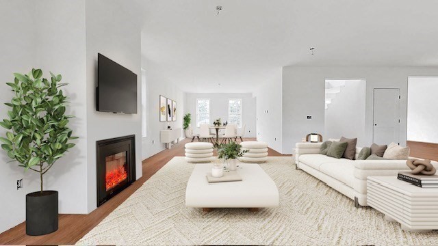 6 Barrows Road Worcester, MA 01609 - Photo 10 of 29 a living room with furniture a fireplace and potted plants