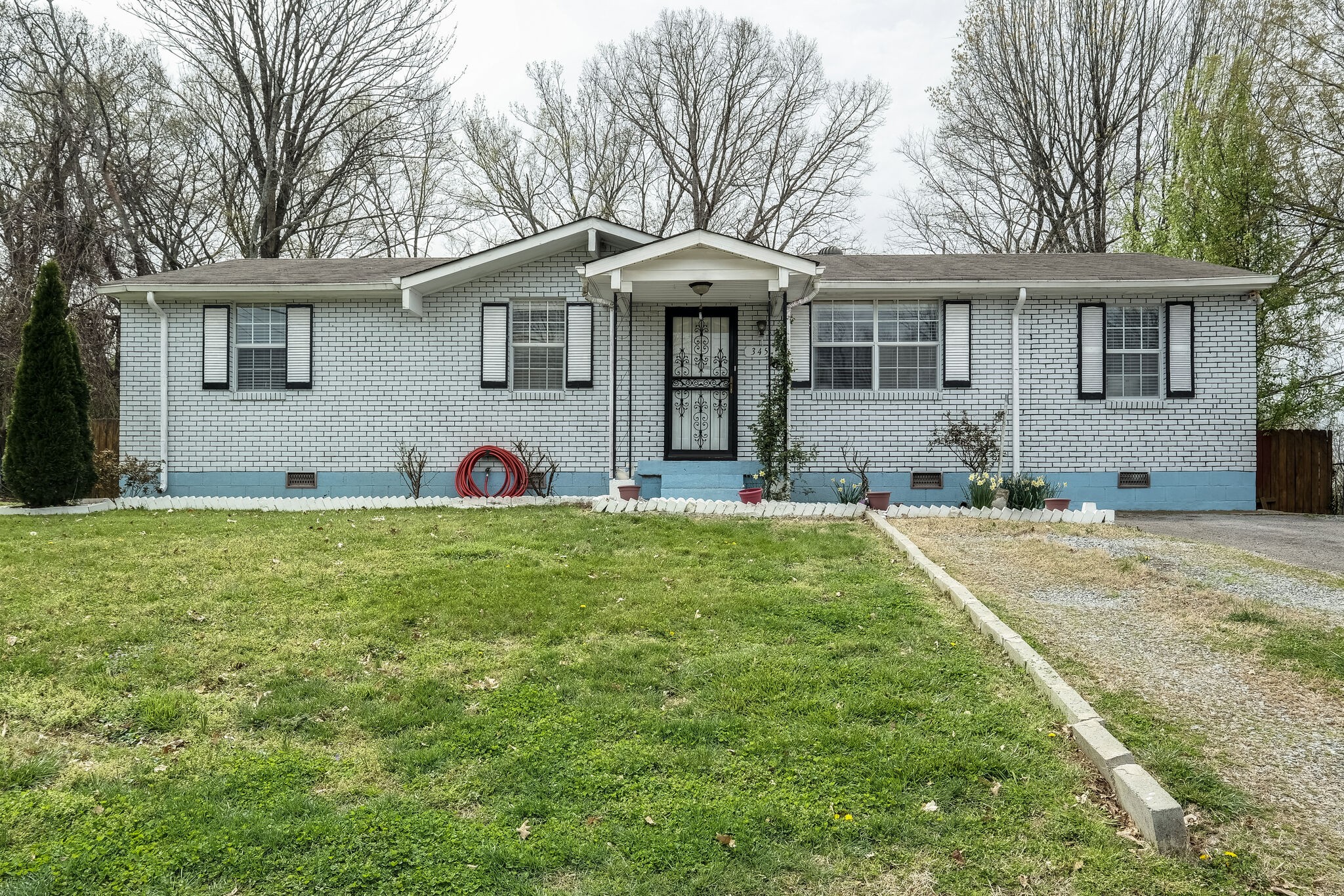 front view of a house with a yard