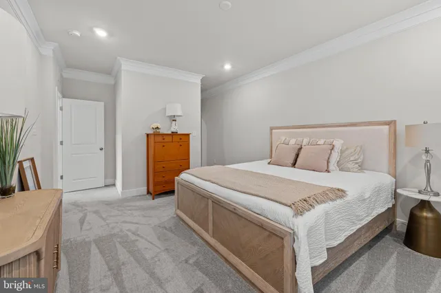 a view of room with window and wooden floor