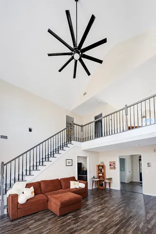 a view of a dining room with furniture and wooden floor