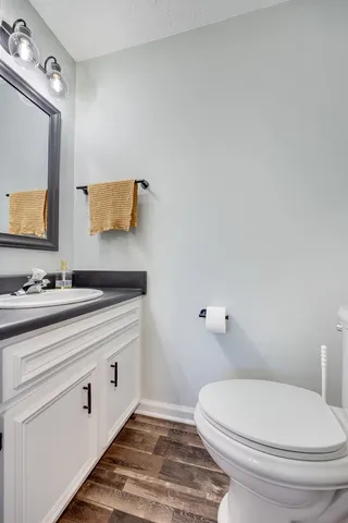 a bed room with a bed and a ceiling fan