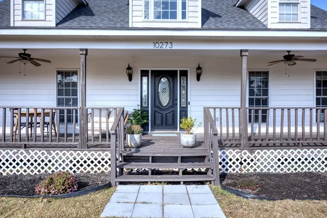 a view of a balcony dining area