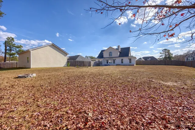 a view of a city with lawn chairs