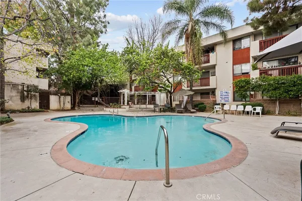 a view of a building with a fountain