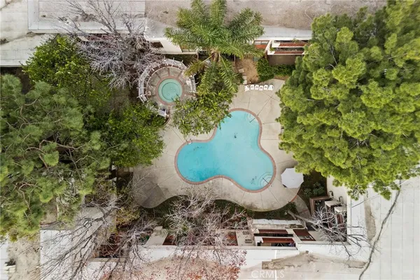 a view of a house with swimming pool