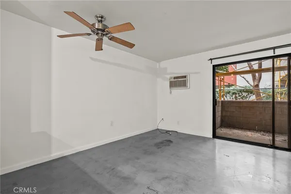 an empty room with sliding door