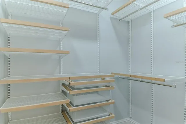 a bathroom with a sink vanity mirror and toilet