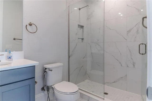 a view of a kitchen with kitchen island a large window in it