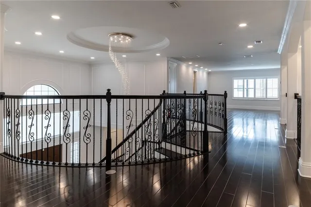 a view of entryway with wooden floor