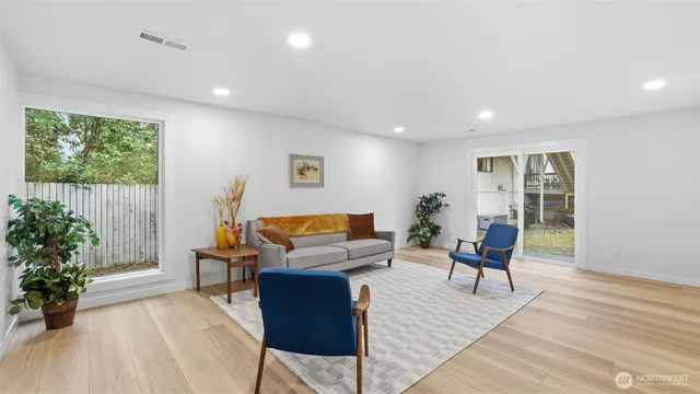 a workspace with furniture and wooden floor