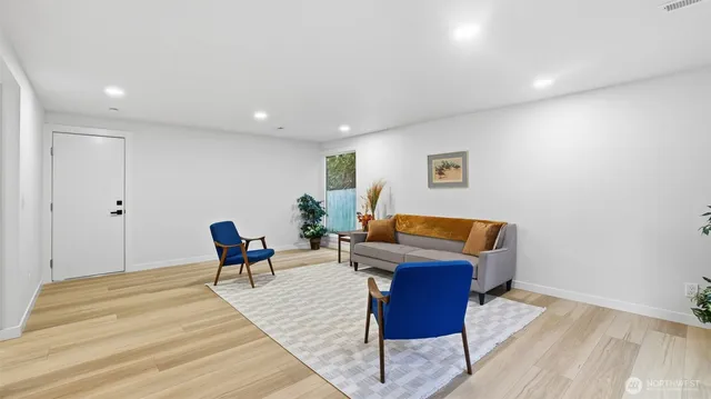 a workspace with furniture and a potted plant