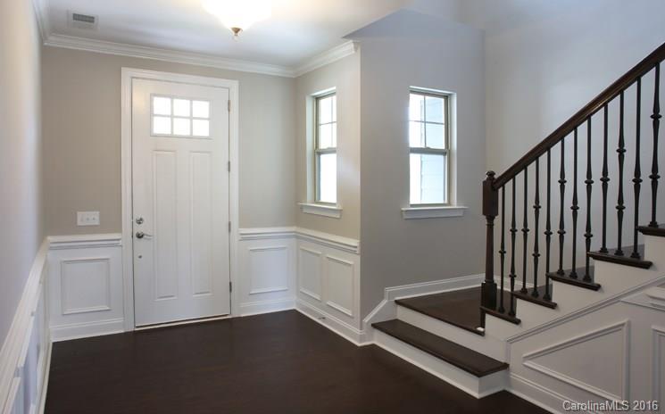 974 Emory Lane, Unit 111 Fort Mill, SC 29708 - Photo 2 of 22 a view of an entryway with wooden floor and door