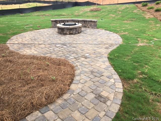 974 Emory Lane, Unit 111 Fort Mill, SC 29708 - Photo 17 of 22 a view of a backyard with sitting area